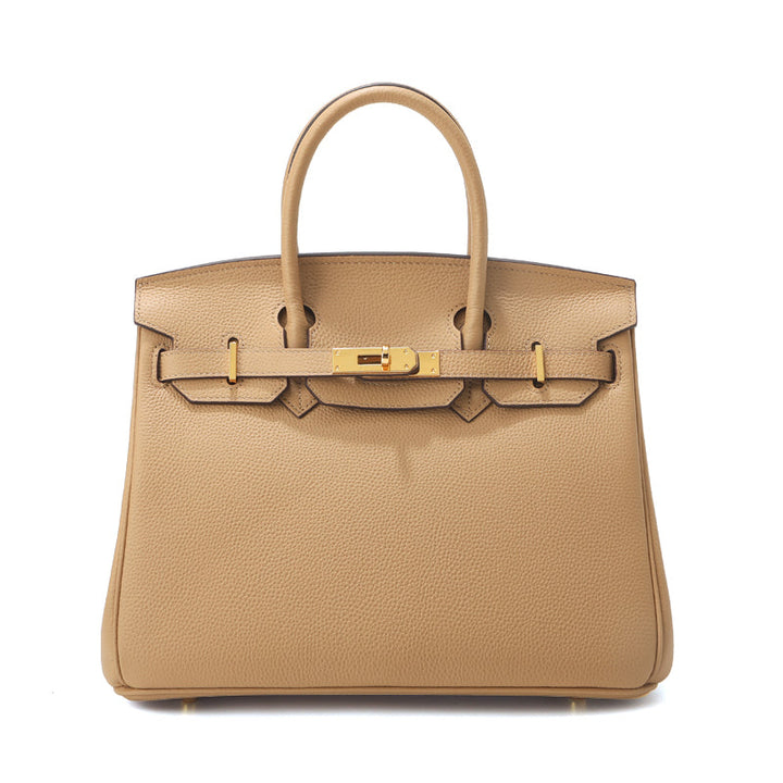 Birk-Handtasche aus Narbenleder mit goldenen Beschlägen