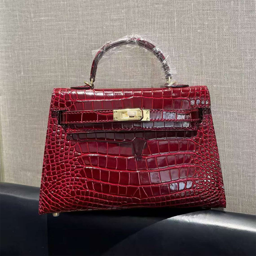 Mini Kylie-Handtasche aus Leder mit Kroko-Prägung