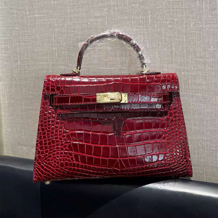 Mini Kylie-Handtasche aus Leder mit Kroko-Prägung