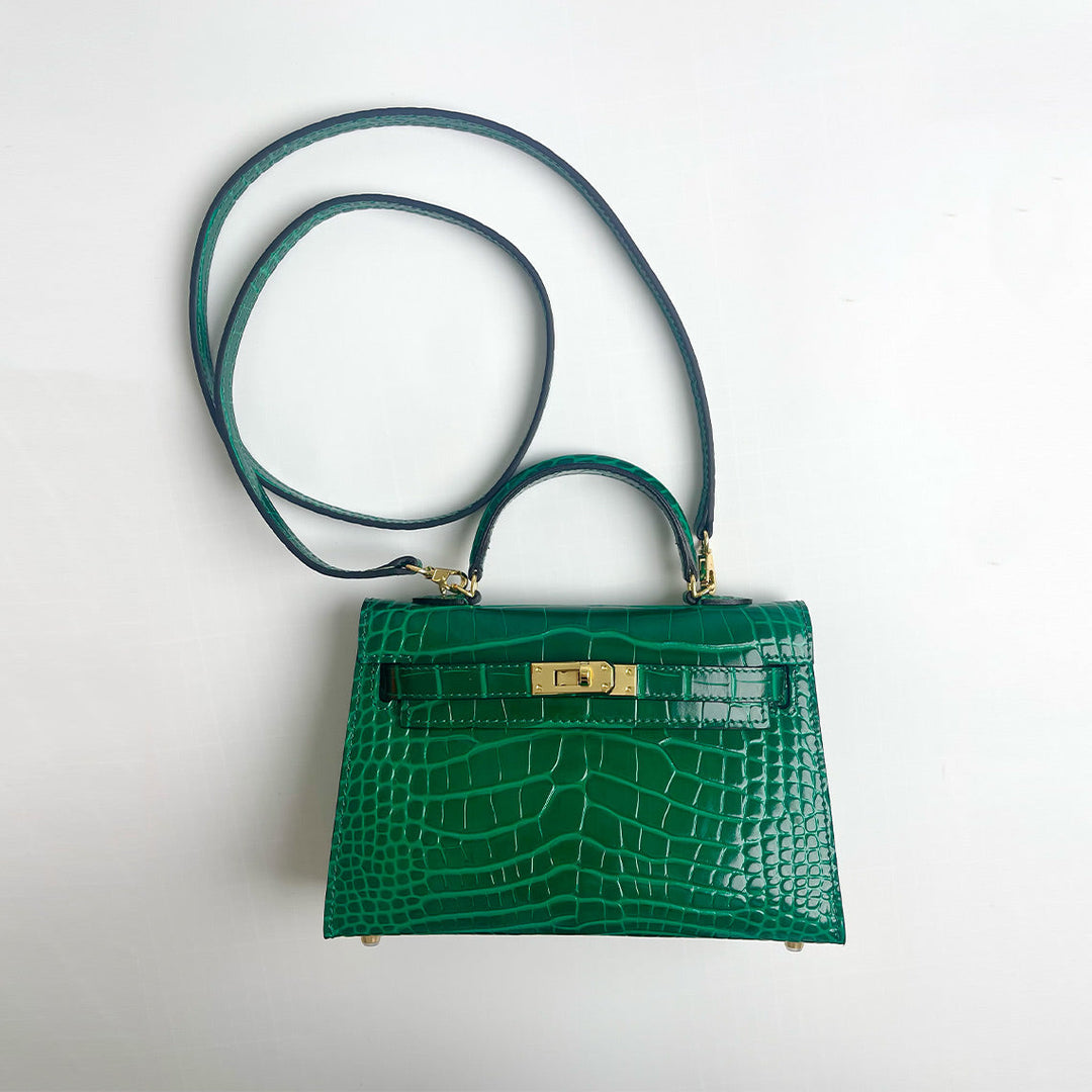 Mini Kylie-Handtasche aus Leder mit Kroko-Prägung und goldfarbenen Beschlägen