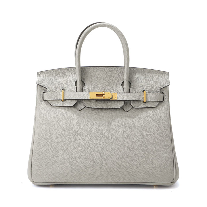 Birk-Handtasche aus Narbenleder mit goldenen Beschlägen