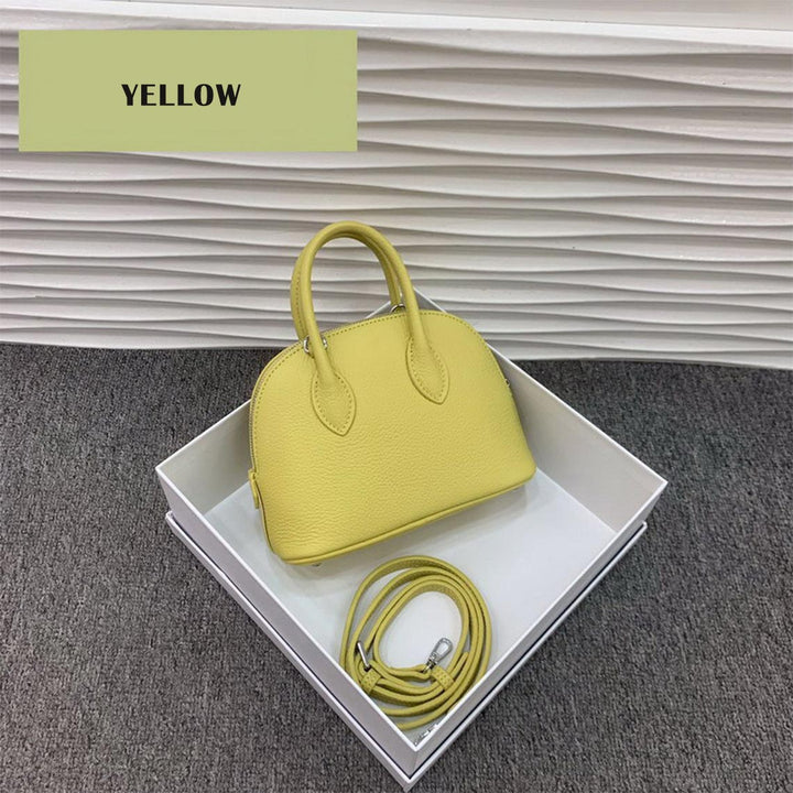 Mini Bowling-Handtasche aus Narbenleder mit silbernen Beschlägen