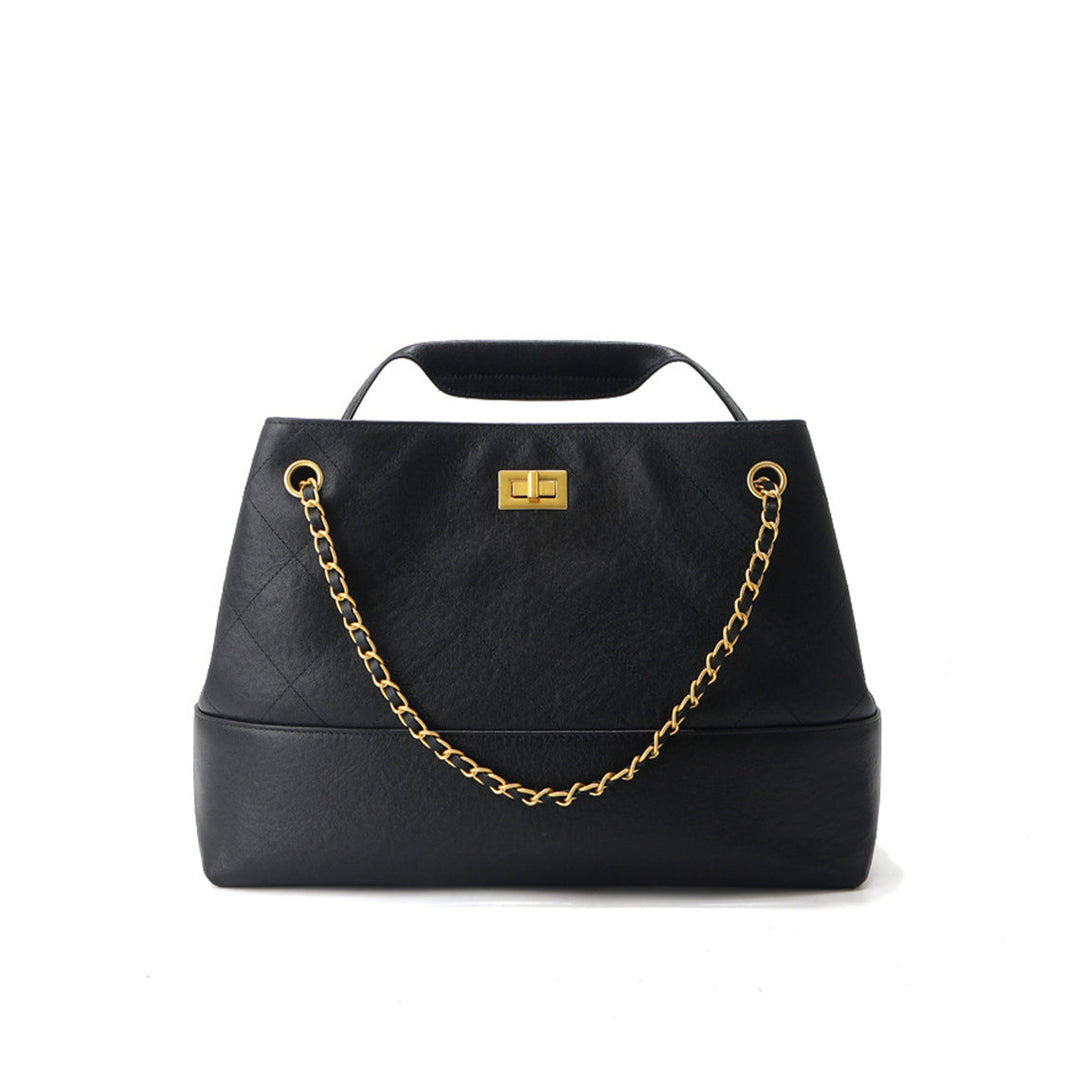 Gesteppte Schultertasche aus Wildleder mit goldfarbenen Beschlägen
