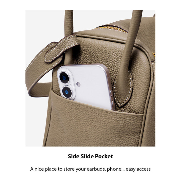 Lindi Tasche aus Narbenleder mit Henkeln und goldenen Beschlägen