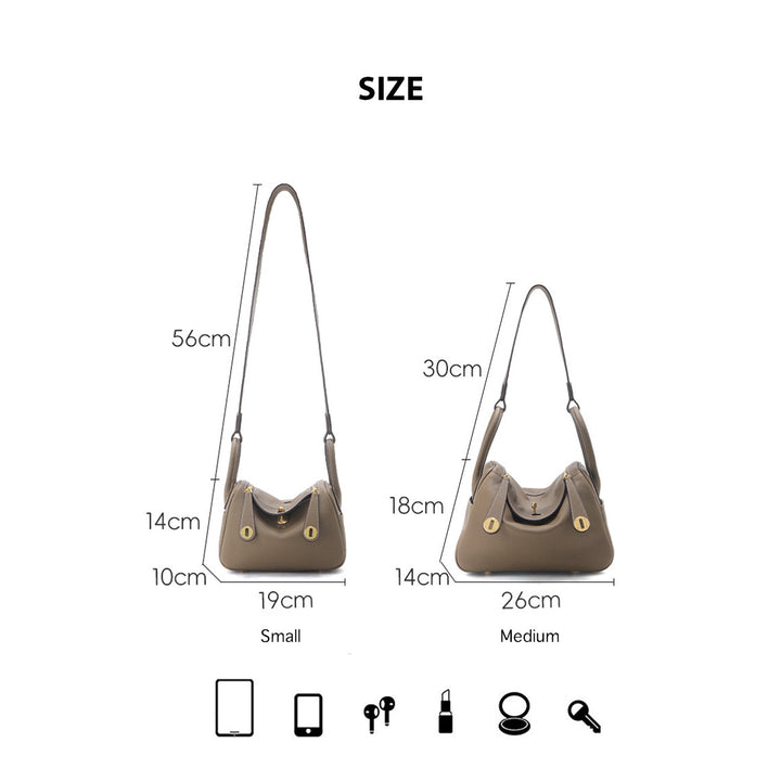 Lindi Tasche aus Narbenleder mit Henkeln und goldenen Beschlägen